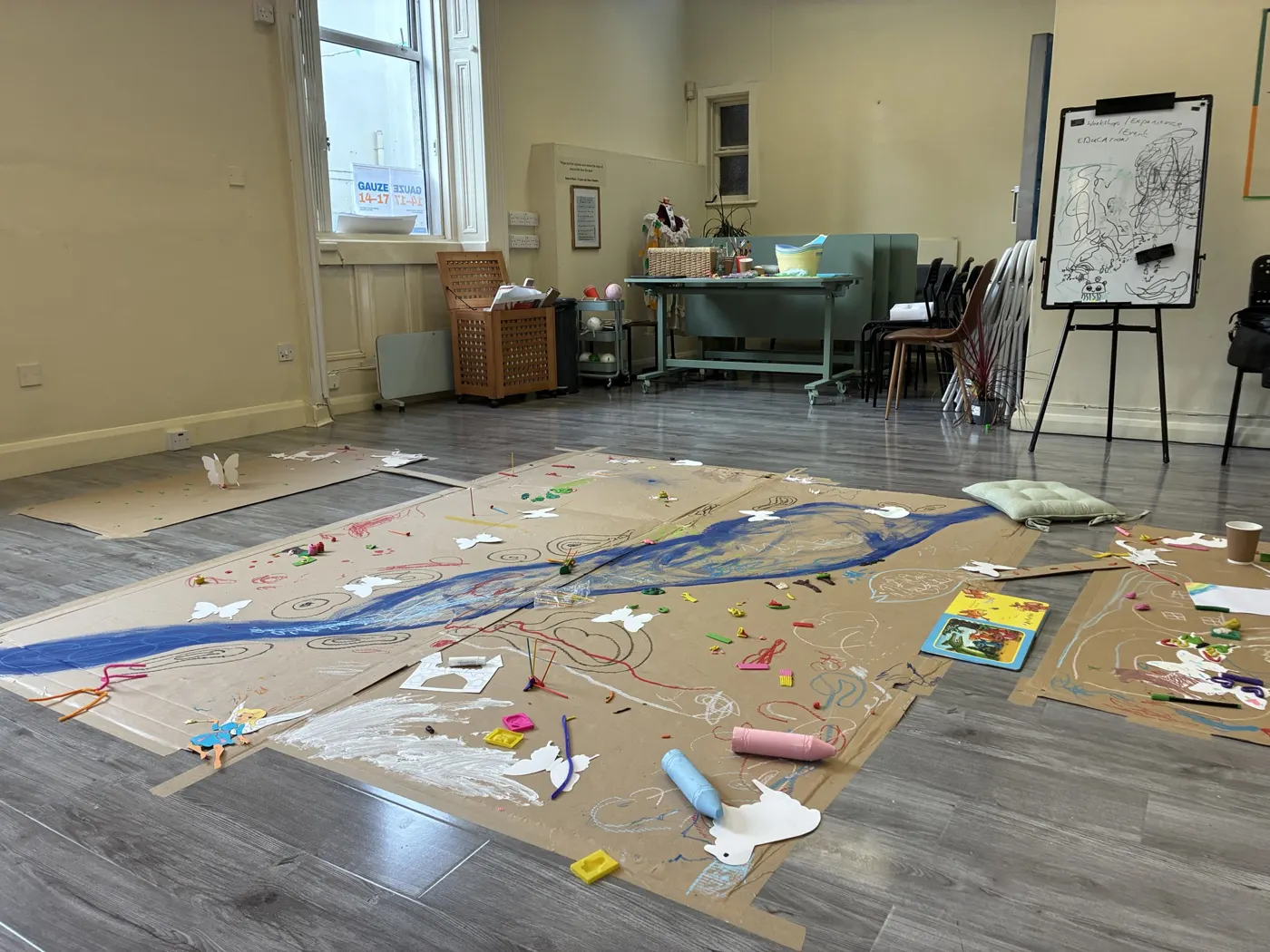 Children’s river map painted across the floor